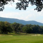 Golfers play Cacapon Resort State Park