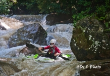 Making sense of whitewater rapid classifications Kayaker on Deckers Creek, Morgantown, West Virginia, Monongalia County, Monongahela Valley Region