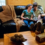 Guests relax in River Expeditions cabin