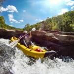 Inflatable kayak in the New River Dries