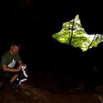 Editor David Sibray inside entrance at Sinks of Gandy