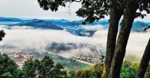 Fog shrouds Williamson, W.Va., as seen from Death Rock.