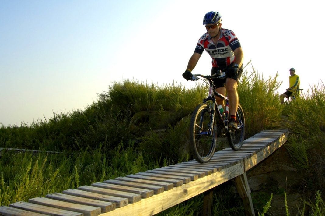 A cyclist crosses at bridge at Mountwood Park near Parkersburg, West Virginia.