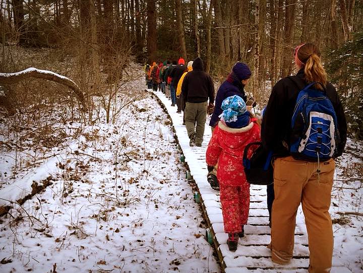 Hikers cross a boardwalk through a marsh near Beckley, West Virginia. Photo courtesy Active SWV.