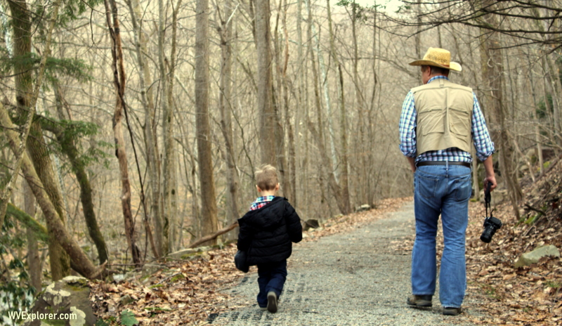West Virginia Explorer editor David Sibray hikes the Glade Creek Trail in West Virginia with a young friend.