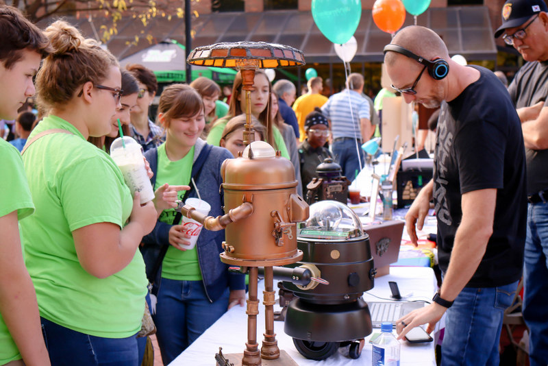Exhibitors explain their craft at the West Virginia Makes Festival.
