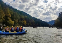 Cool autumn weather could super-charge Gauley River rafting A raft launches into the Gauley River during an exciting excursion with River Expeditions.