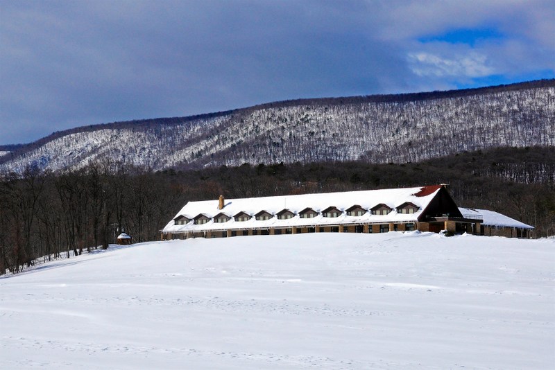 Great Cacapon Mountain rises behind Cacapon State Park Lodge on a winter day. (Photo courtesy W.Va. Dept. of Commerce)