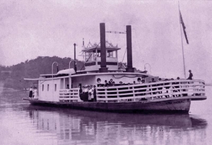 Passengers line the bow of the Nina Paden as it ferries across the Ohio River near Parkersburg, West Virginia.