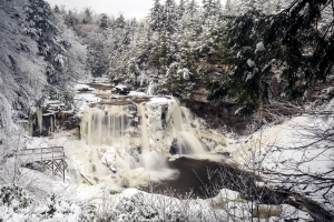 Vapor from Blackwater Falls freezes across the icy landscape at the head of the Blackwater Canyon. 