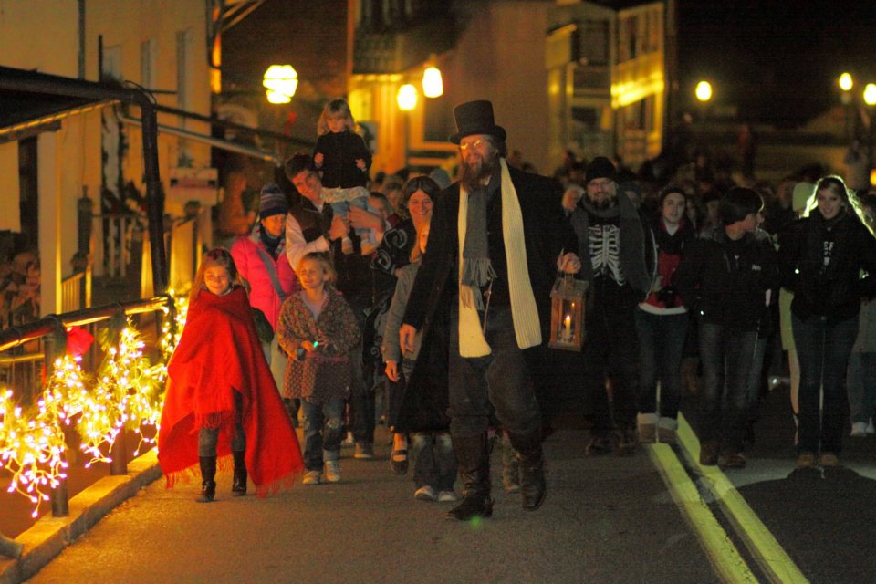 Visitors walk Potomac Street during Christmas in Harpers Ferry, West Virginia.