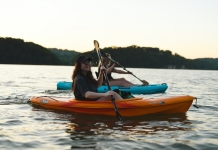 Despite river traffic, the scenic Ohio can be a safe kayaking destination Kayakers On The Ohio River in West Virginia