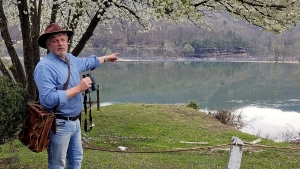 West Virginia Explorer editor David Sibray points out the location of VanBibber's Rock from the lawn of the Glen Ferris Inn.