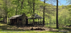 A rustic camp overlooks the Elk River near the mouth of Twistabout Creek.