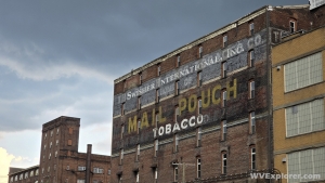 With its Mail Pouch sign, the Bloch Brothers factory in South Wheelin was later owned by the Swisher Company, manufacturer of Swisher Sweets cigars.
