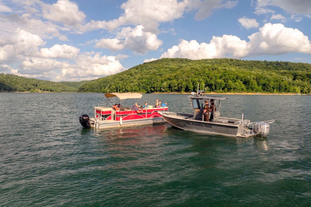 Natural Resources Police officers encounter boaters on a West Virginia lake.
